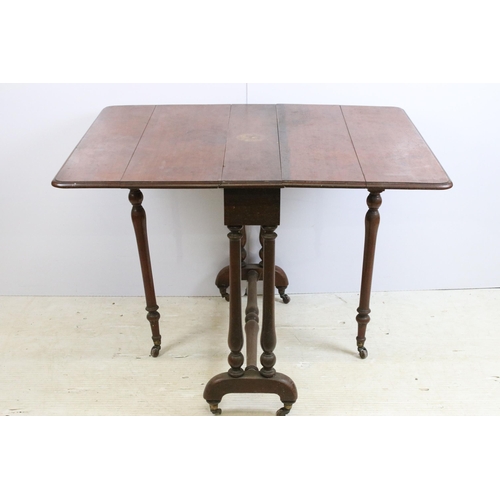 638 - Mahogany folding gateleg table on original casters with twin flaps, H 72cm