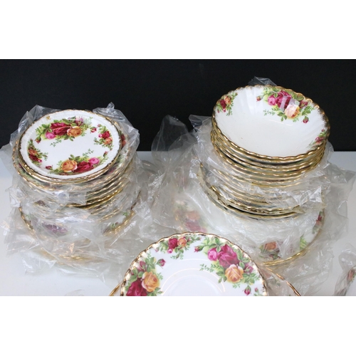 82 - Royal Albert 'Old Country Roses' set to include ten saucers, twelve bowls, six side plates, twelve t... 