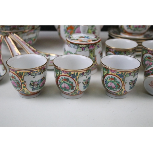 96 - Hand painted Chinese famille rose tea set to include teapot, lidded sugar pot, milk jug, six cups an... 