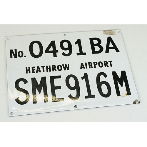 135 - Reproduction Heathrow Airport enamel sign having a white background with black lettering. Measures 2... 