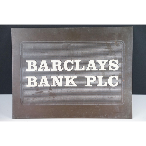 138 - Barclays Bank PLC metal wall sign with white enamelled lettering. Measures 24 x 31.5cm.