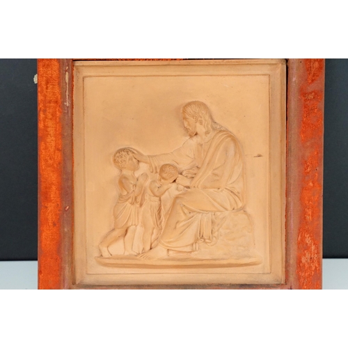 145 - P Ipsen (1815-1860) - A framed terracotta classical plaque of a seated man with children, set within... 