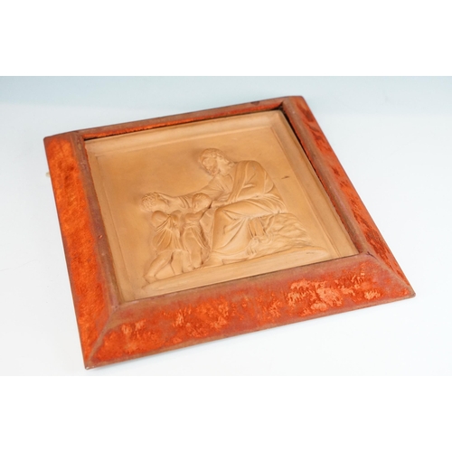 145 - P Ipsen (1815-1860) - A framed terracotta classical plaque of a seated man with children, set within... 