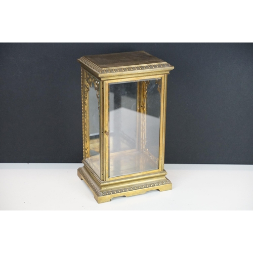 149 - Early 20th Century brass and glass display / clock case having bevelled glass with reeded glass pane... 