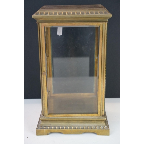 149 - Early 20th Century brass and glass display / clock case having bevelled glass with reeded glass pane... 