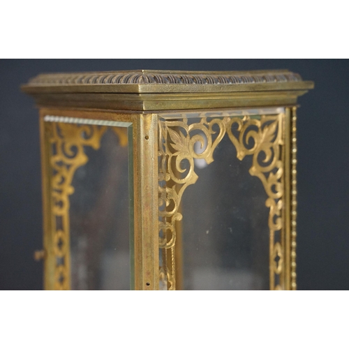 149 - Early 20th Century brass and glass display / clock case having bevelled glass with reeded glass pane... 