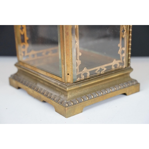 149 - Early 20th Century brass and glass display / clock case having bevelled glass with reeded glass pane... 