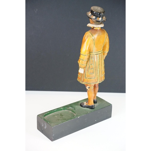 150 - Extra Dry Beefeater Gin countertop advertising figure raised on a plinth base with vacancy for gun b... 