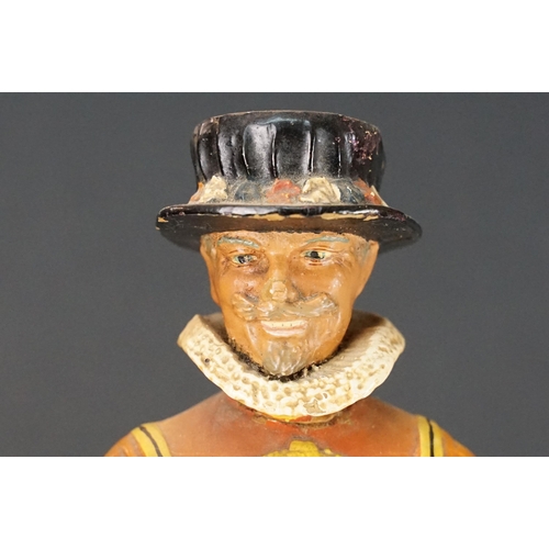 150 - Extra Dry Beefeater Gin countertop advertising figure raised on a plinth base with vacancy for gun b... 