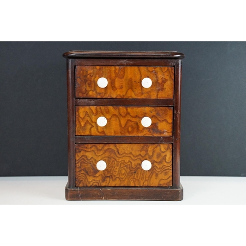 158 - late 19th / early 20th Century apprentice miniature chest of drawers with ceramic knob handles.