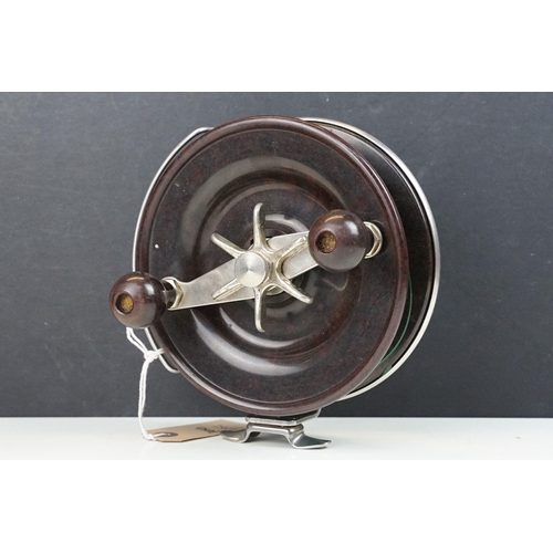 211 - An Australian 'Alvey Snapper' sea fishing reel, stamped 655/C12/7 of Stainless steel and Bakelite co... 