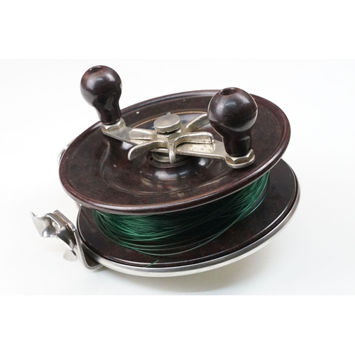 211 - An Australian 'Alvey Snapper' sea fishing reel, stamped 655/C12/7 of Stainless steel and Bakelite co... 