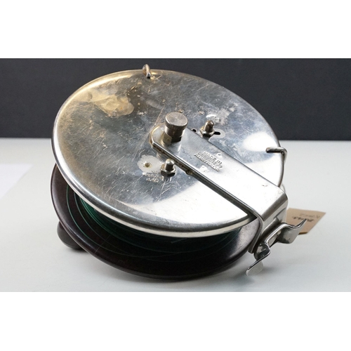 211 - An Australian 'Alvey Snapper' sea fishing reel, stamped 655/C12/7 of Stainless steel and Bakelite co... 