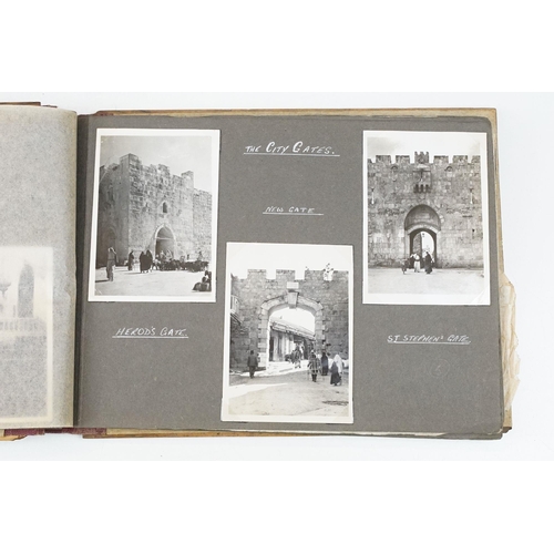 212 - A mid 20th century Israel olive wood photograph album with depiction of the Citadel in Jerusalem to ... 