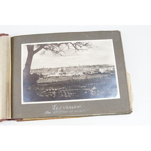 212 - A mid 20th century Israel olive wood photograph album with depiction of the Citadel in Jerusalem to ... 