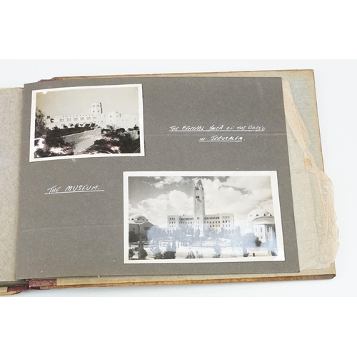 212 - A mid 20th century Israel olive wood photograph album with depiction of the Citadel in Jerusalem to ... 