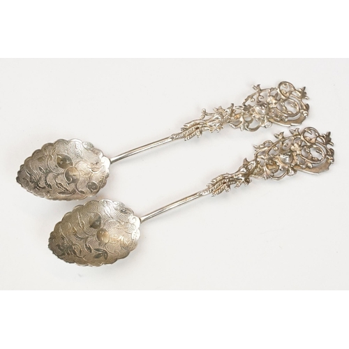 215 - A pair of fully hallmarked sterling silver bonbon dishes with pierced decoration together with a col... 