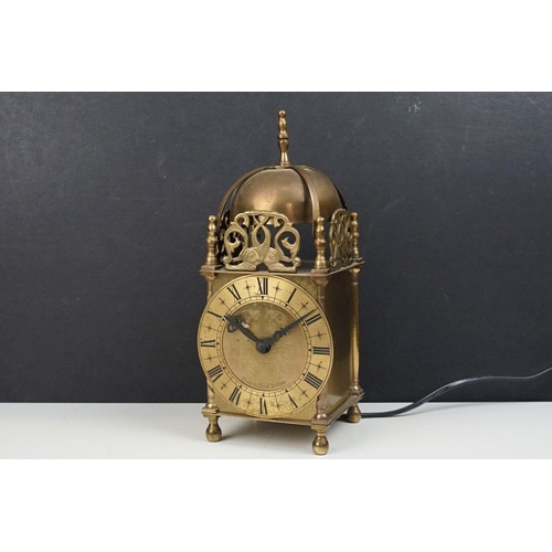 220 - A Vintage brass cased Smiths lantern clock with electric movement.