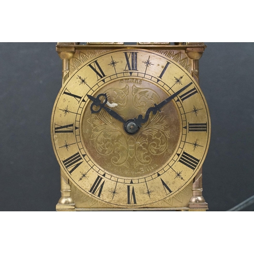 220 - A Vintage brass cased Smiths lantern clock with electric movement.