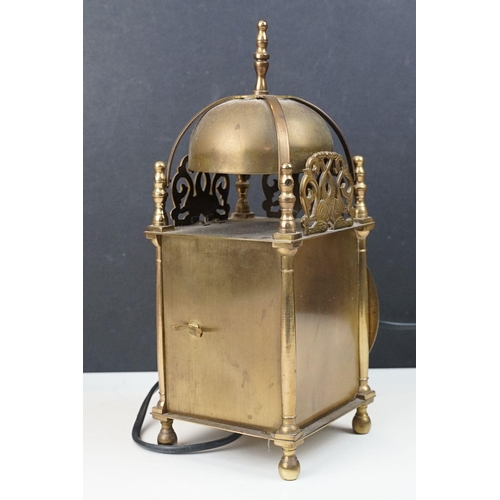 220 - A Vintage brass cased Smiths lantern clock with electric movement.