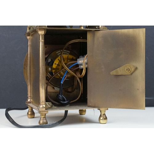 220 - A Vintage brass cased Smiths lantern clock with electric movement.