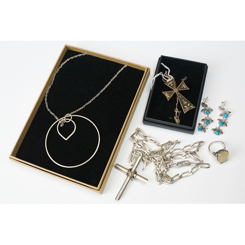 221 - A small collection of jewellery to include a fully hallmarked sterling silver cross on white metal c... 