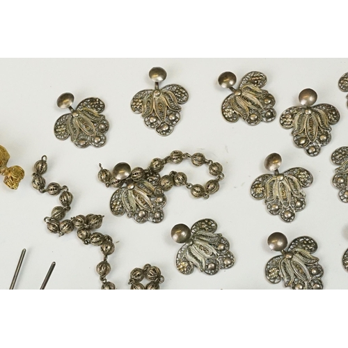 224 - A collection of white metal and gilt filigree costume jewellery to include earrings, bracelets and p... 