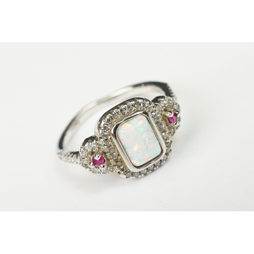 227 - A ladies Art Deco style dress ring with opal to centre, marked S925 to the inner shank.