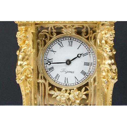 228 - 19th century style French Rococo carriage clock with key