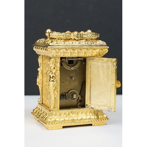 228 - 19th century style French Rococo carriage clock with key