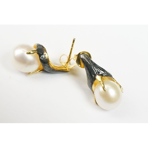 234 - Pair of cultured pearl and enamel stud earrings