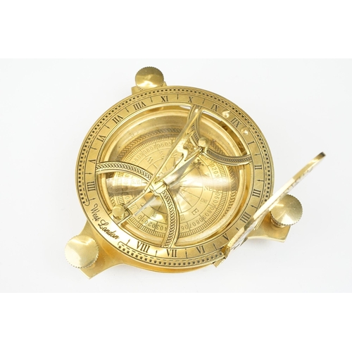 236 - Brass compass and sundial with three levelling posts