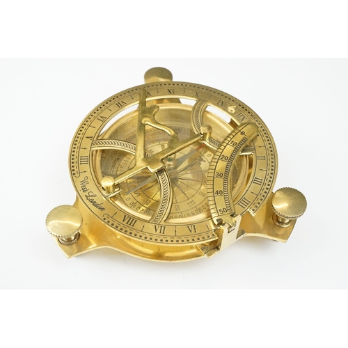 236 - Brass compass and sundial with three levelling posts