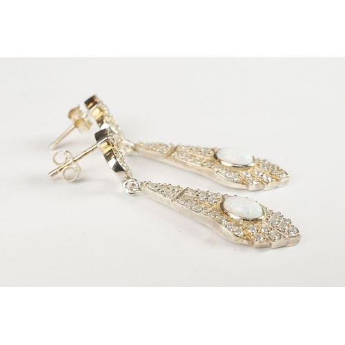 247 - Pair of silver CZ and opal panelled drop earrings