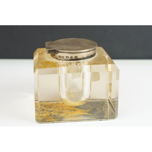 264 - Two glass ink wells to include a fully hallmarked sterling silver lidded example, assay marked for B... 