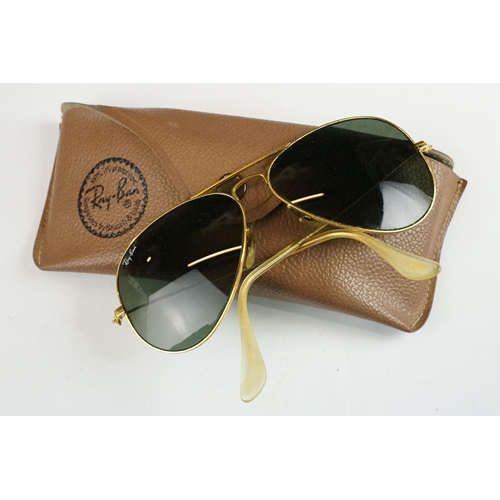 271 - A pair of vintage Ray-Ban Aviator sunglasses within original fitted case.