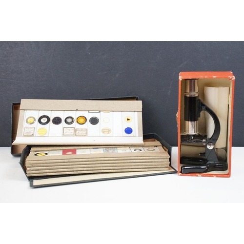 298 - A vintage British made 'Eclipse' students microscope together with a good selection of microscope gl... 