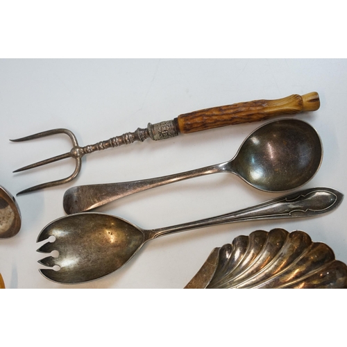 300 - A collection of fully hallmarked sterling silver and silver plate to include scalloped dishes, napki... 