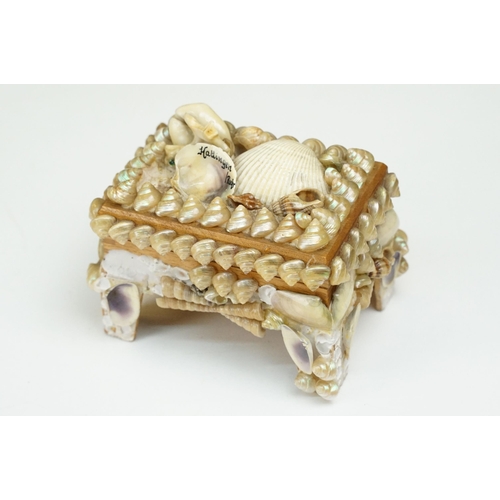 321 - A collection of five vintage hand decorated shell encrusted trinket boxes.