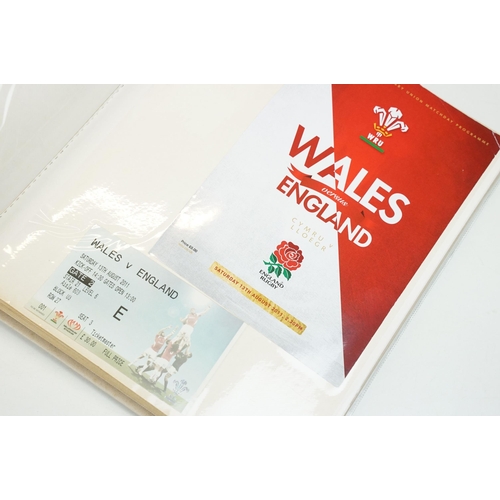 326 - A group of Welsh Rugby collectables to include an album of ephemera to include signed photos and pos... 