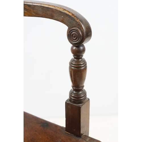 335 - 19th century mahogany child's chair with scroll arms, carved ball and bar back, curved solid seat on... 