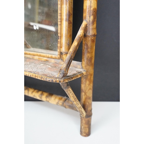 161 - Victorian aesthetic movement bamboo framed mirror shelf having mirror to centre with shelf below. Me... 