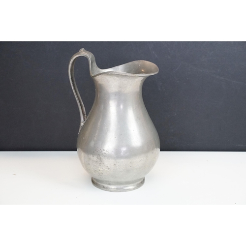 167 - Reproduction 18th Century pewter jug marked 1760 to base.