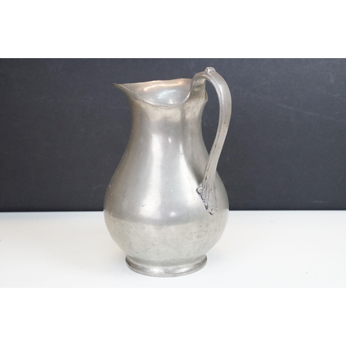 167 - Reproduction 18th Century pewter jug marked 1760 to base.