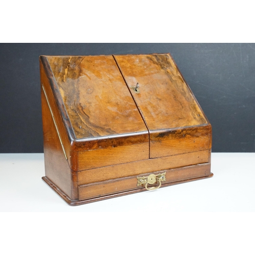 168 - 19th Century walnut writing box having a sloped twin door top opening to reveal letter rack within w... 