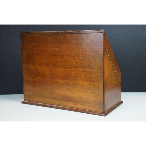 168 - 19th Century walnut writing box having a sloped twin door top opening to reveal letter rack within w... 