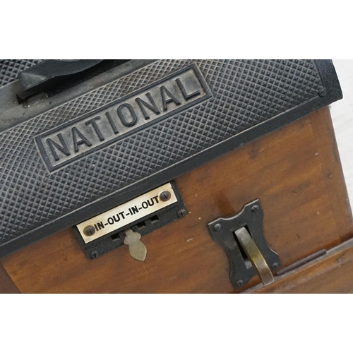 175 - National Time Recorder punching in machine with oak case, dial marked Aquinas Street London SE1, pla... 