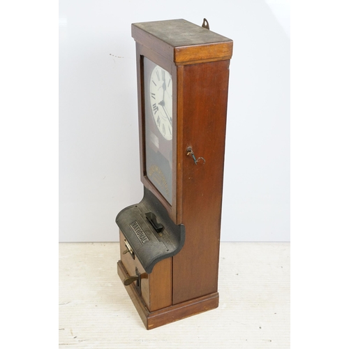 175 - National Time Recorder punching in machine with oak case, dial marked Aquinas Street London SE1, pla... 