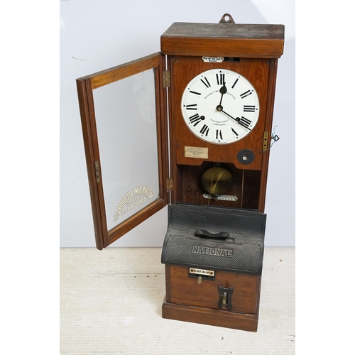 175 - National Time Recorder punching in machine with oak case, dial marked Aquinas Street London SE1, pla... 