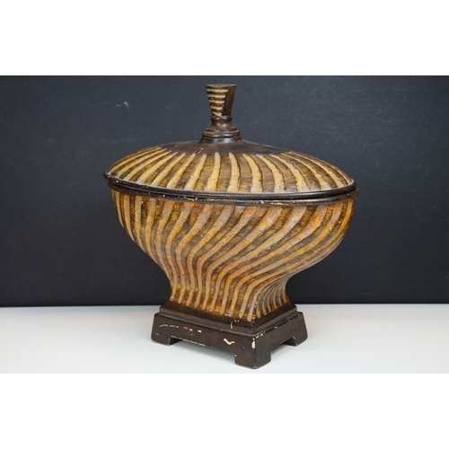 178 - Cast resin urn lidded pot having reeded detailing and a plinth base. Measures 39cm wide.